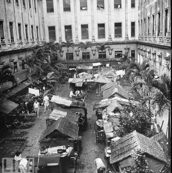 Many of the Allie internees have built huts, called shanties, to escape crowded conditions in the dormitories.